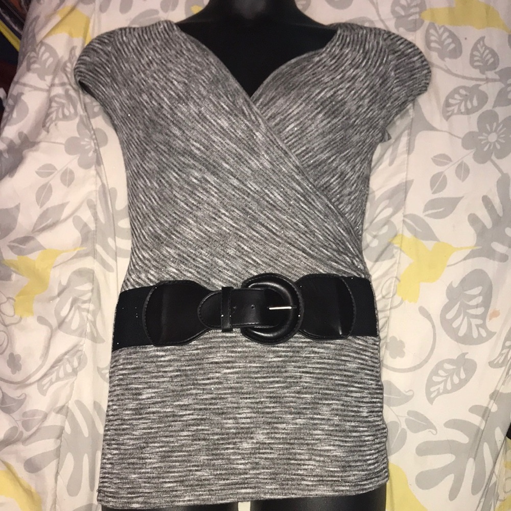 Open chested tops with a black belt